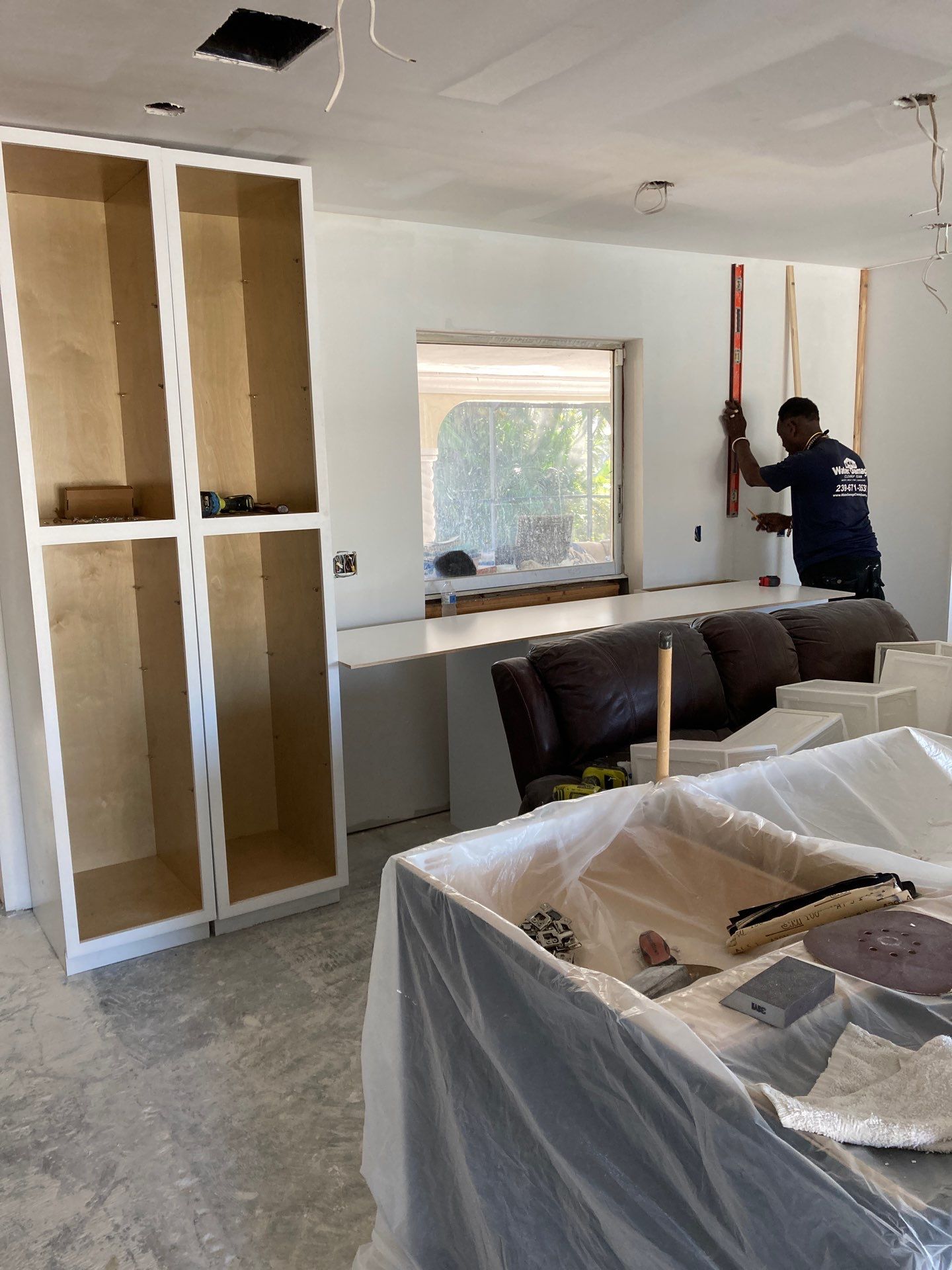 Water Damage Restoration Team Member working on repairs in Cape Coral, FL